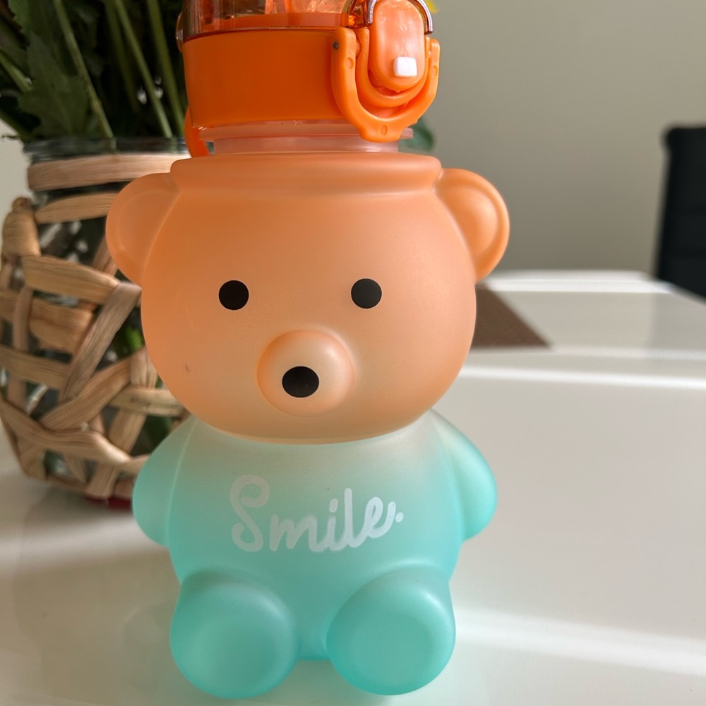 Orange and Blue Stuffed Animals with Cartoon Features